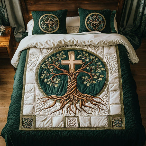 Cross of Mercy quilted 3-piece bedding set on a made bed in a softly lit bedroom