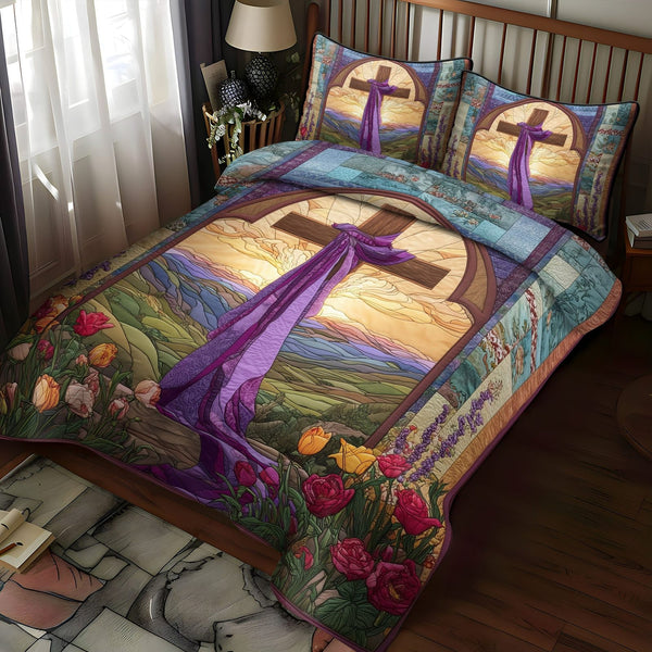 Cross of Unfailing Love quilted 3-piece bedding set on a made bed in a softly lit bedroom