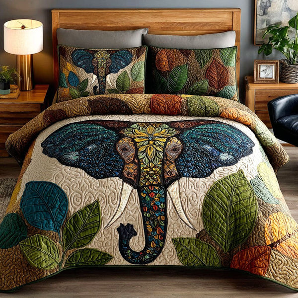 Crowned Giant quilted 3-piece bedding set on a made bed with two matching pillow shams