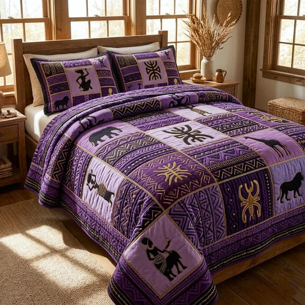 Cultural Rhythm quilted 3-piece bedding set on a made bed with two matching pillow shams