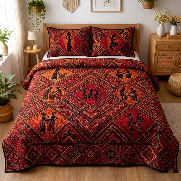 Cultural Rhythm quilted 3-piece bedding set on a made bed with two matching pillow shams