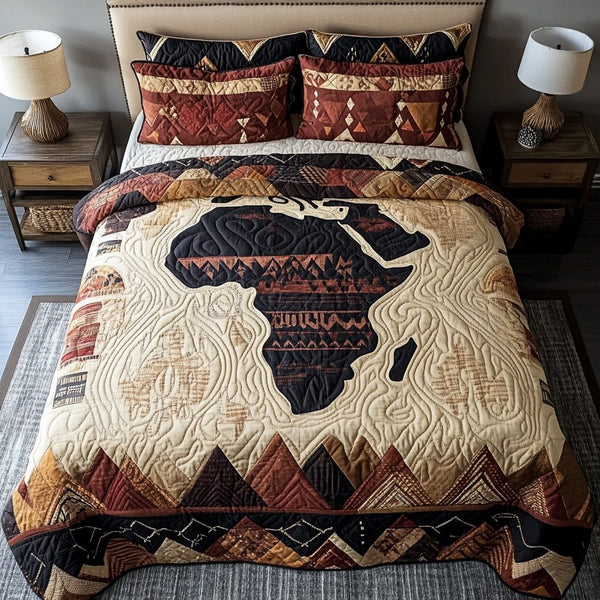 Cultural Roots quilted 3-piece bedding set on a made bed with two matching pillow shams