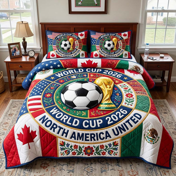 Cup United quilted 3-piece bedding set on a made bed with two matching pillow shams