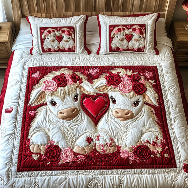 Cupid Cows quilted 3-piece bedding set on a made bed with two matching pillow shams