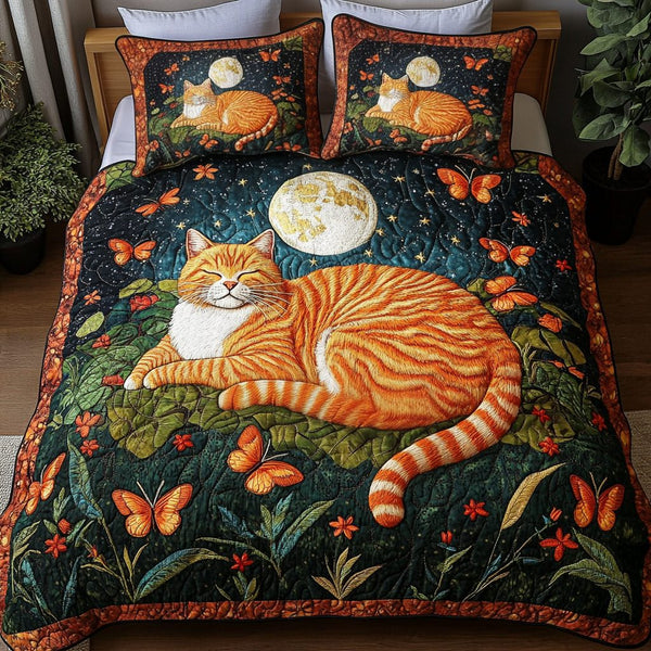 Curious Cat Chronicles quilted 3-piece bedding set on a made bed with two matching pillow shams