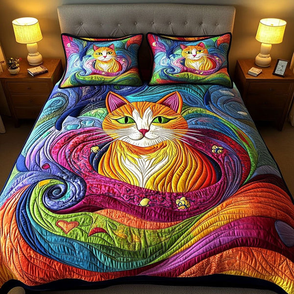 Curious Cat Chronicles quilted 3-piece bedding set on a made bed with two matching pillow shams