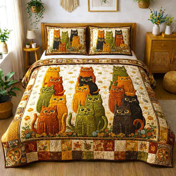 Curious Cat quilted 3-piece bedding set on a made bed with two matching pillow shams