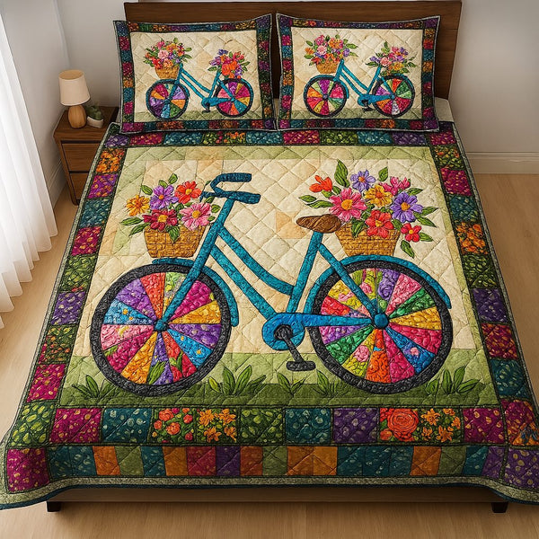 Cycle of Colors quilted 3-piece bedding set on a made bed with two matching pillow shams