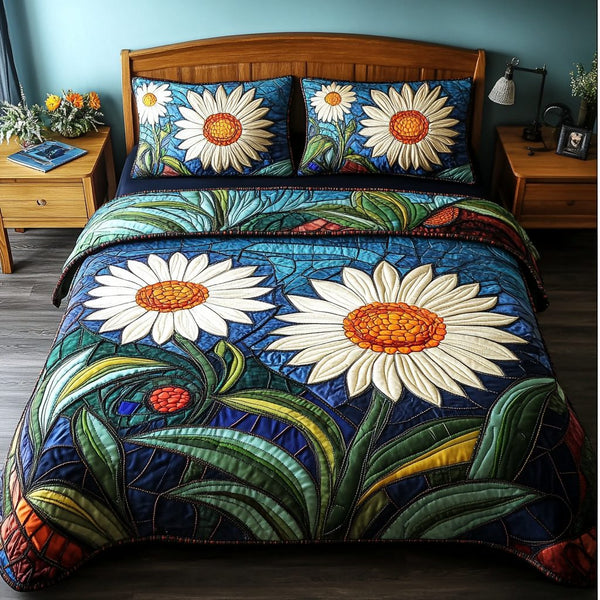 Daisy Delight quilted 3-piece bedding set on a made bed with two matching pillow shams