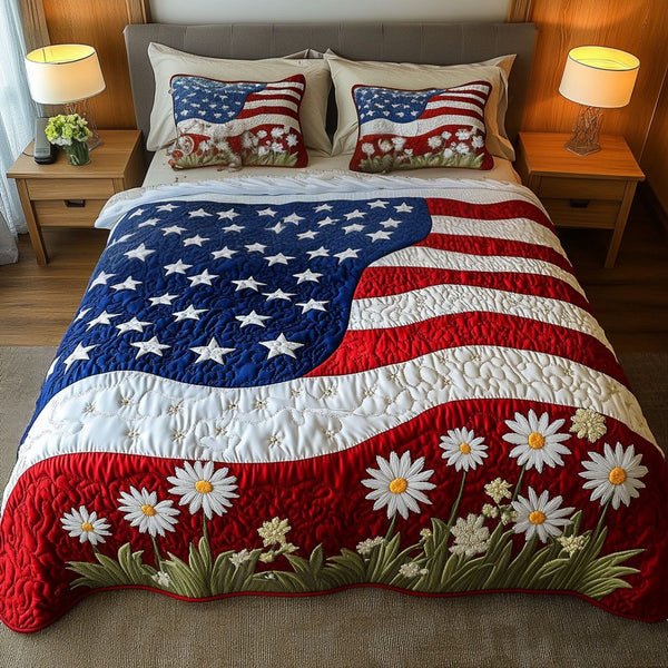 Daisy Dreams quilted 3-piece bedding set on a made bed with two matching pillow shams
