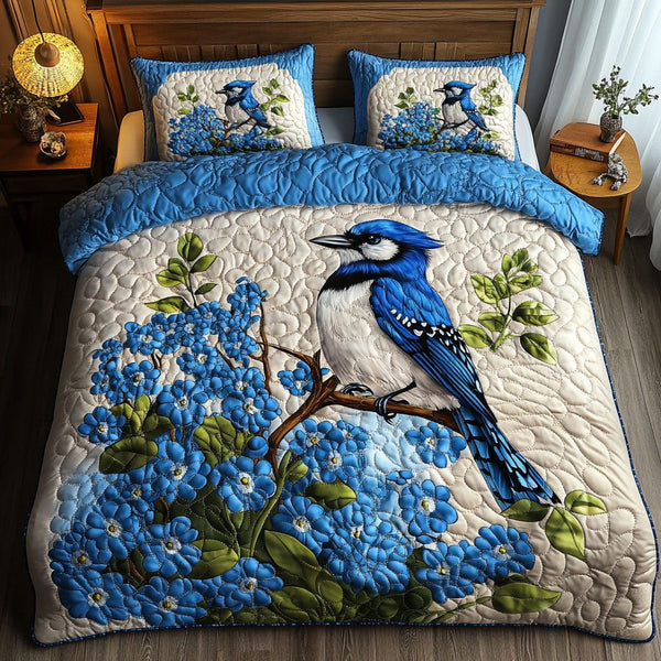 Daisy Encounter quilted 3-piece bedding set on a made bed with two matching pillow shams