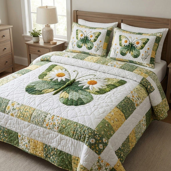 Daisywing quilted 3-piece bedding set on a made bed with two matching pillow shams