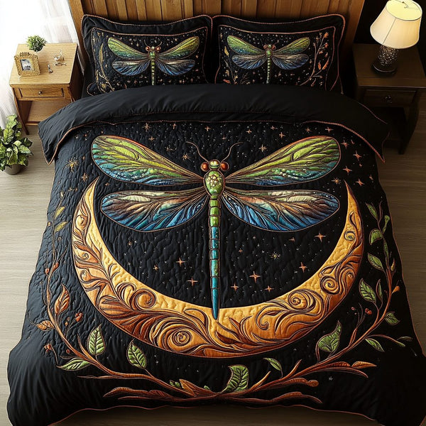 Dancing Dragonfly quilted 3-piece bedding set on a made bed with two matching pillow shams