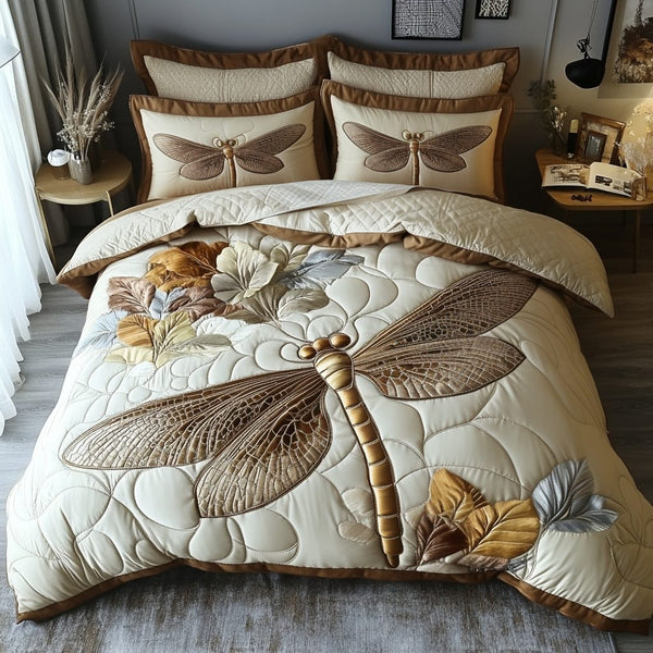 Dancing Dragonfly quilted 3-piece bedding set on a made bed with two matching pillow shams