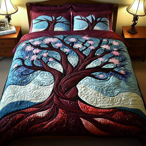 Dancing Petals quilted 3-piece bedding set on a made bed with two matching pillow shams
