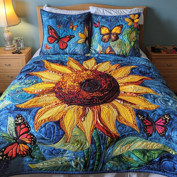 Dancing Sunflowers quilted 3-piece bedding set on a made bed with two matching pillow shams