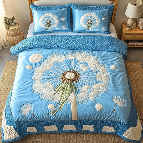 Dandelion Whisper quilted 3-piece bedding set on a made bed with two matching pillow shams