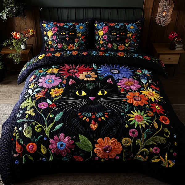 Dark Meadow quilted 3-piece bedding set on a made bed with two matching pillow shams