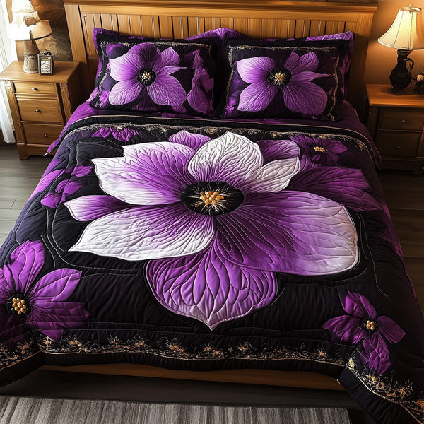 Dark Purple Flower quilted 3-piece bedding set on a made bed with two matching pillow shams