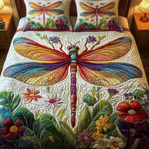 Dazzling Wings quilted 3-piece bedding set on a made bed with two matching pillow shams