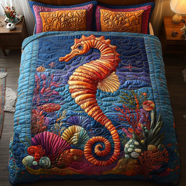 Deep Blue Comfort quilted 3-piece bedding set on a made bed with two matching pillow shams