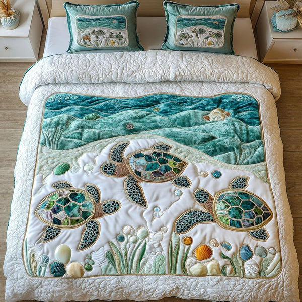 Deep Blue quilted 3-piece bedding set on a made bed with two matching pillow shams