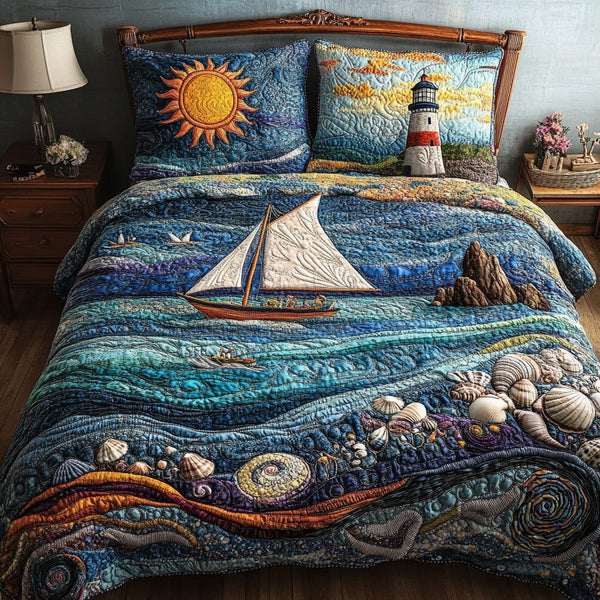 Deep Blue Waters quilted 3-piece bedding set on a made bed with two matching pillow shams