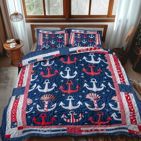 Deep Sea Anchors quilted 3-piece bedding set on a made bed in a light coastal bedroom
