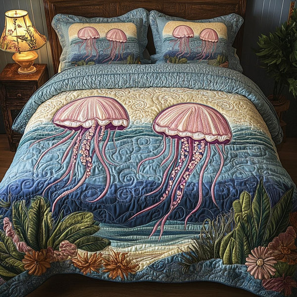Deep Waters quilted 3-piece bedding set on a made bed with two matching pillow shams