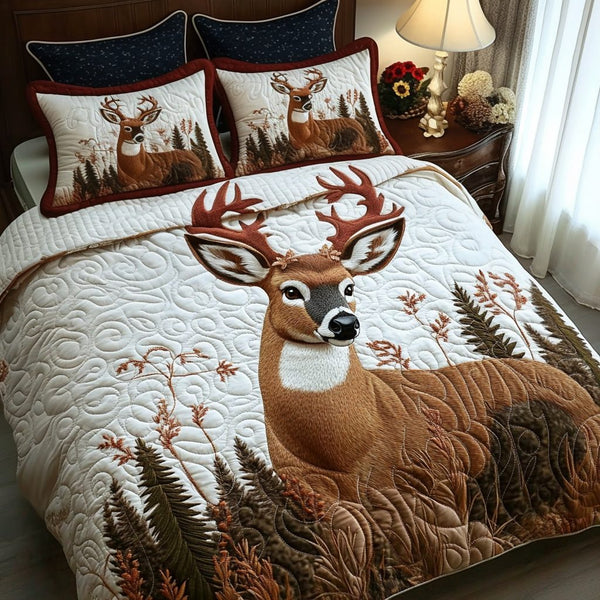 Deer Glory quilted 3-piece bedding set on a made bed with two matching pillow shams