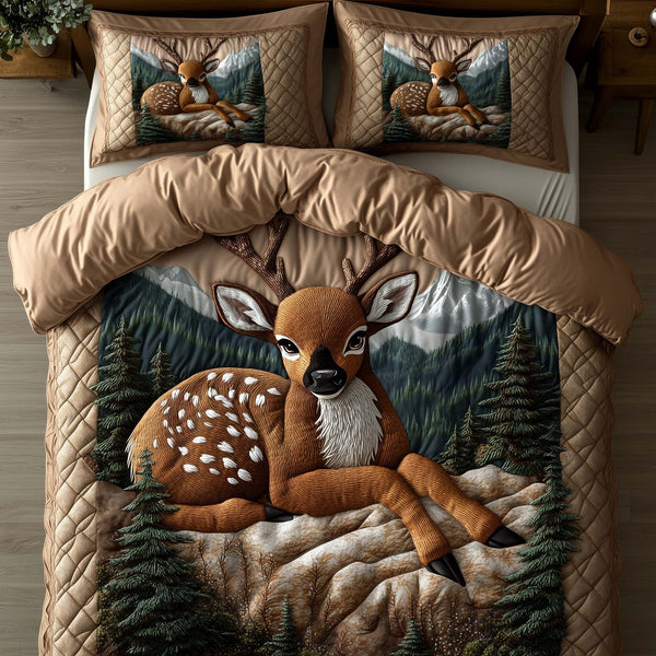 Deer Serenity quilted 3-piece bedding set on a made bed with two matching pillow shams