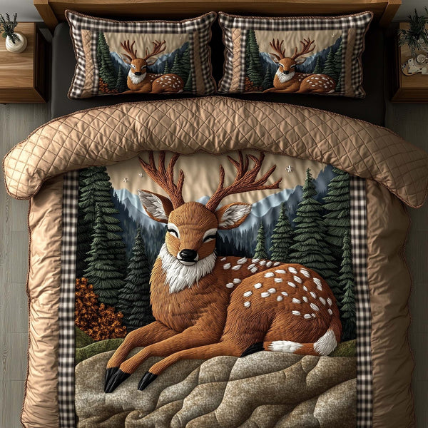 Deer Serenity quilted 3-piece bedding set on a made bed with two matching pillow shams