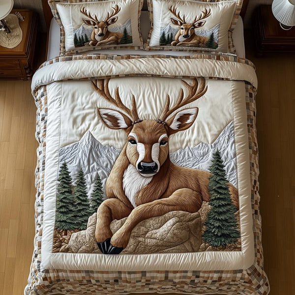 Deer Serenity quilted 3-piece bedding set on a made bed with two matching pillow shams
