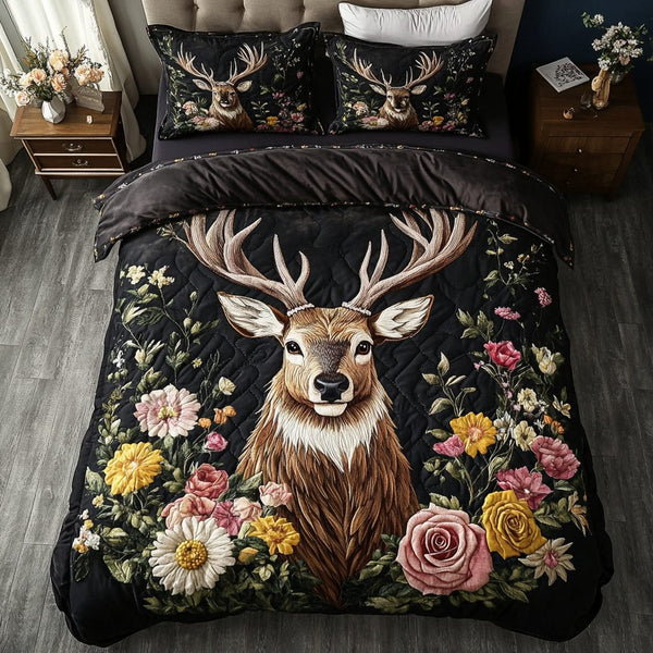 Deer Tracks quilted 3-piece bedding set on a made bed with two matching pillow shams