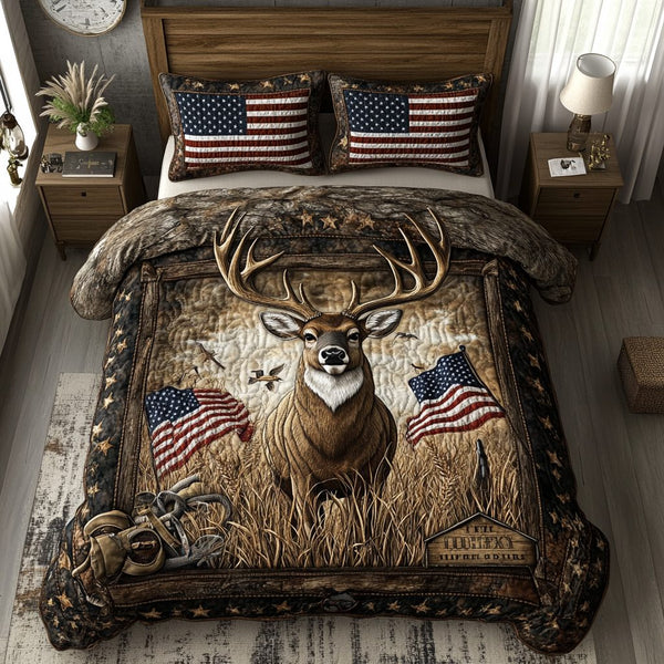 Deer Trail quilted 3-piece bedding set on a made bed with two matching pillow shams