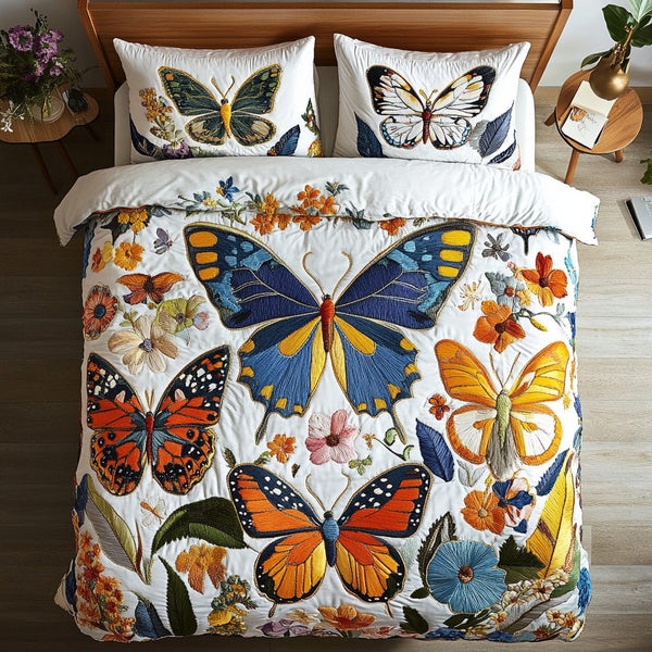 Delicate Flight quilted 3-piece bedding set on a made bed with two matching pillow shams