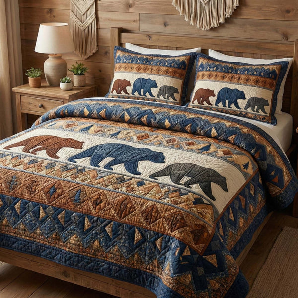 Denim Wilderness quilted 3-piece bedding set on a made bed with two matching pillow shams