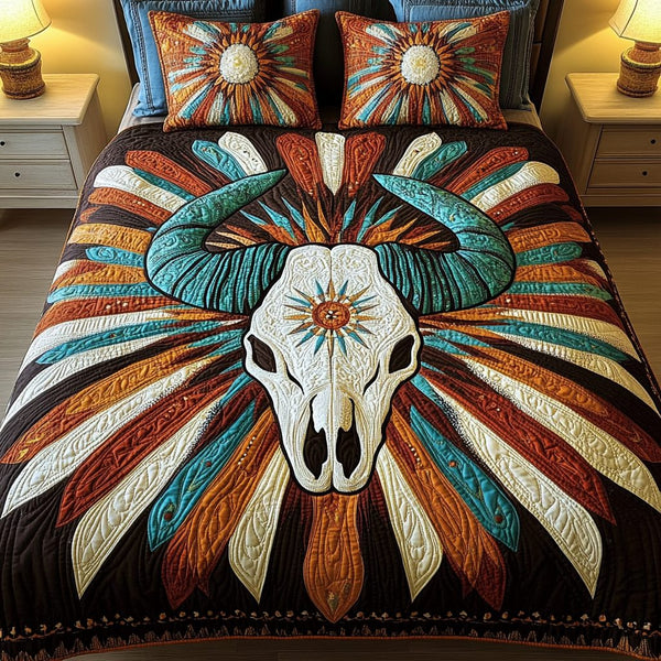 Desert Aura quilted 3-piece bedding set on a made bed with two matching pillow shams