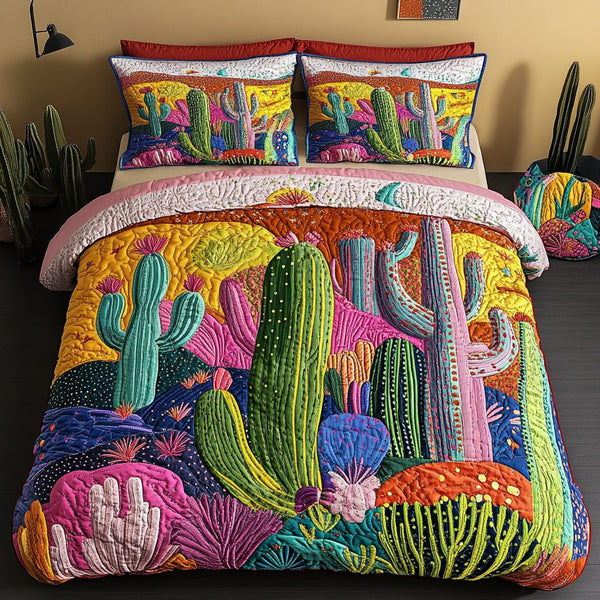 Desert Bloom quilted 3-piece bedding set on a made bed with two matching pillow shams
