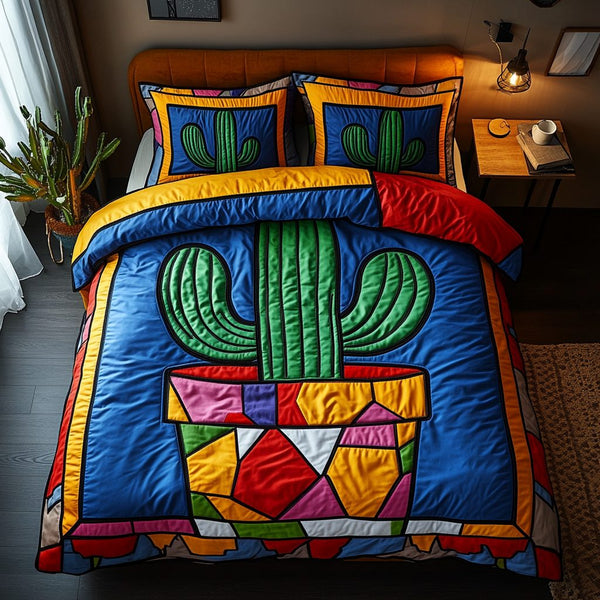 Desert Bloom quilted 3-piece bedding set on a made bed with two matching pillow shams