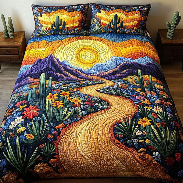 Desert Bloom Trail quilted 3-piece bedding set on a made bed with two matching pillow shams