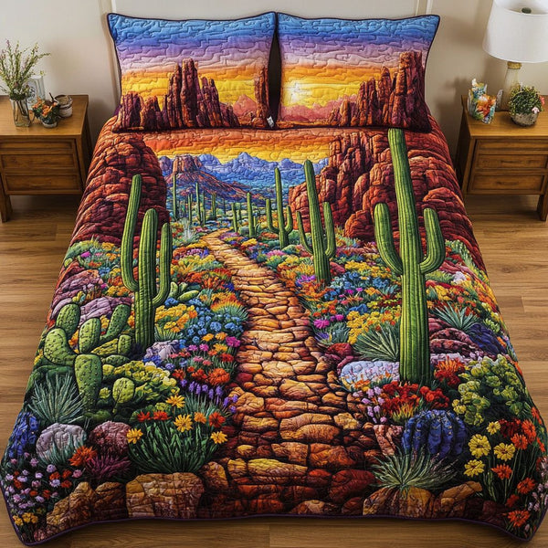 Desert Cactus Trail quilted 3-piece bedding set on a made bed with two matching pillow shams