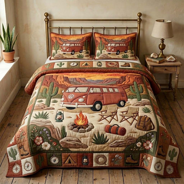 Desert Camper quilted 3-piece bedding set on a made bed with two matching pillow shams