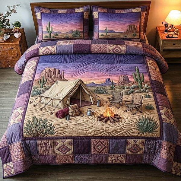 Desert Campfire quilted 3-piece bedding set on a made bed with two matching pillow shams