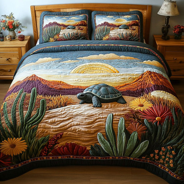 Desert Companion quilted 3-piece bedding set on a made bed with two matching pillow shams