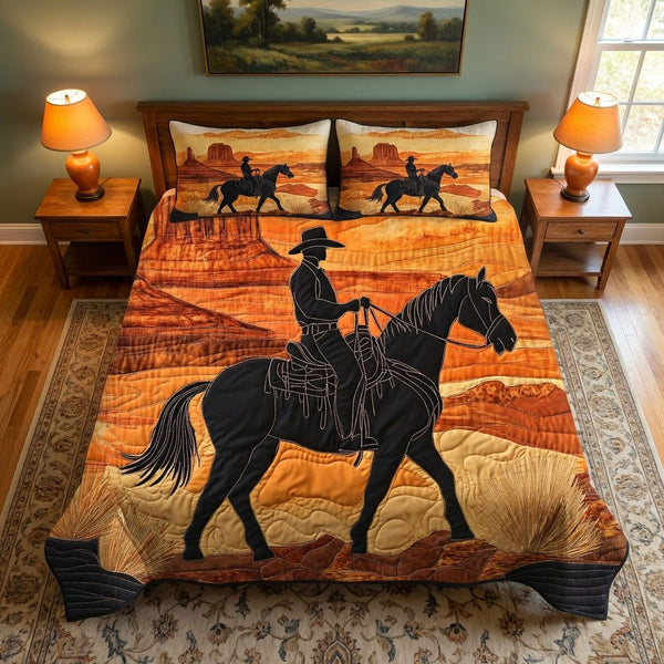 Desert Denim quilted 3-piece bedding set on a made bed with two matching pillow shams