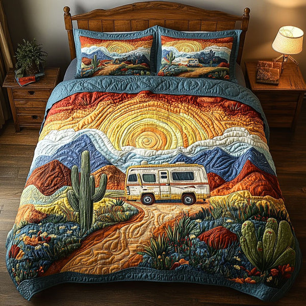 Desert Dreamer quilted 3-piece bedding set on a made bed with two matching pillow shams