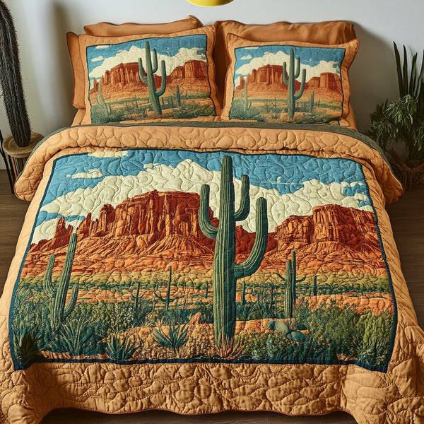 Desert Dreams quilted 3-piece bedding set on a made bed with two matching pillow shams