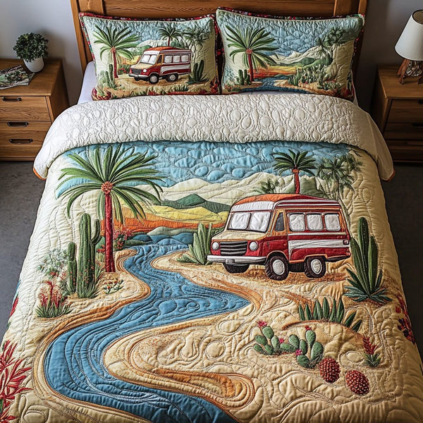 Desert Dreams quilted 3-piece bedding set on a made bed with two matching pillow shams