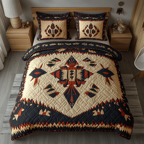 Desert Echoes quilted 3-piece bedding set on a made bed with two matching pillow shams